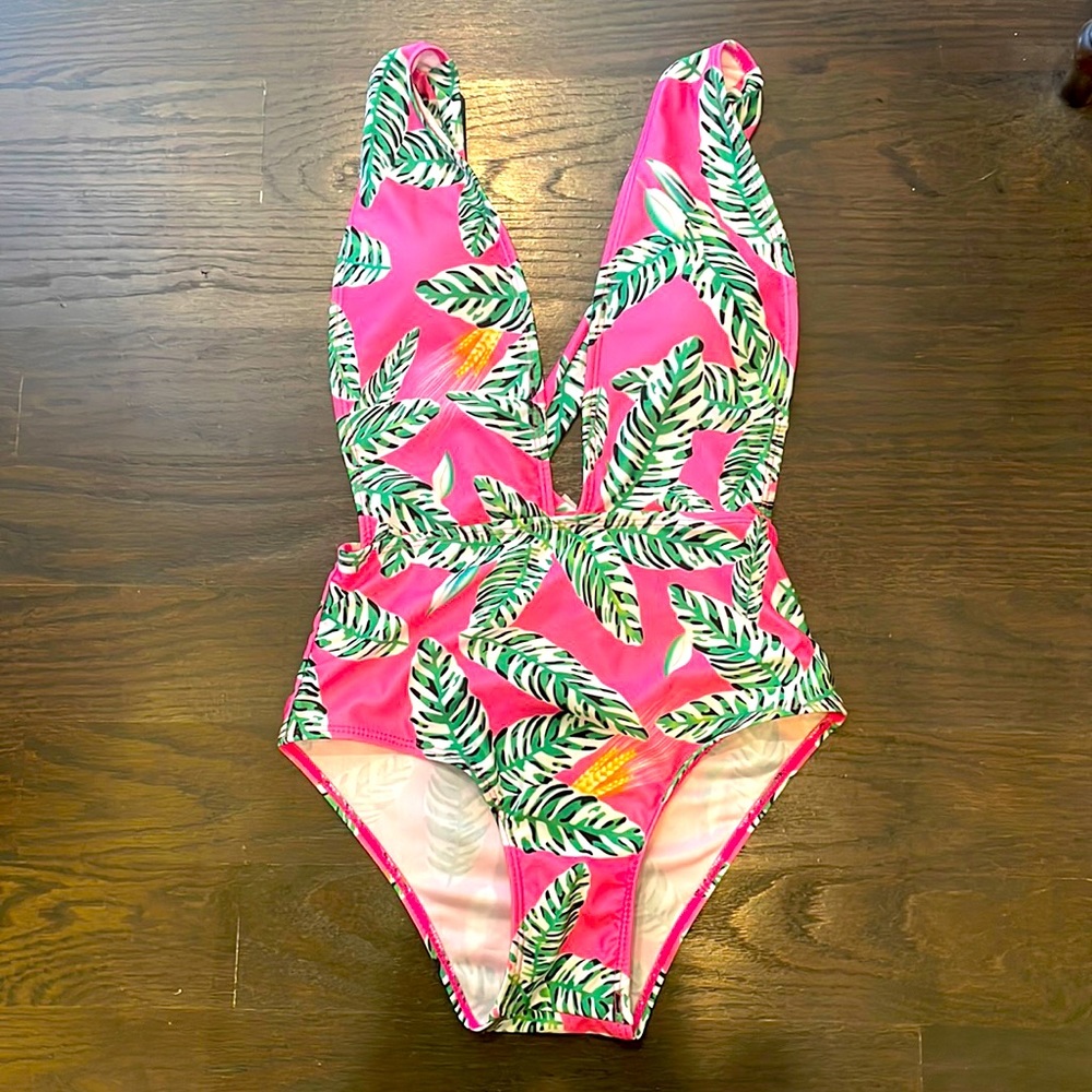 Goodnight macaroon one piece swimsuit. Low back and low cut in front- size small